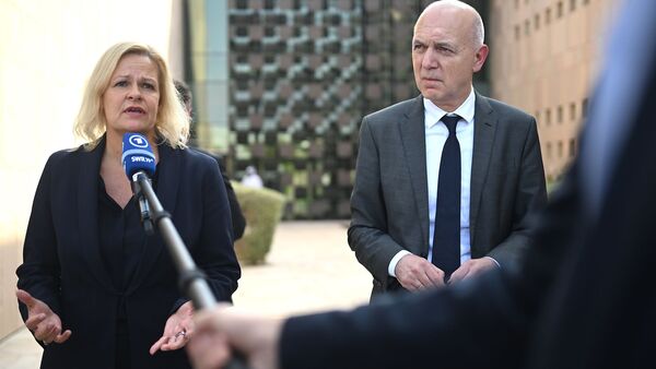Sind auf Besuch in Katar: Innenministerin Nancy Faeser und DFB-Boss Bernd Neuendorf., © Britta Pedersen/dpa