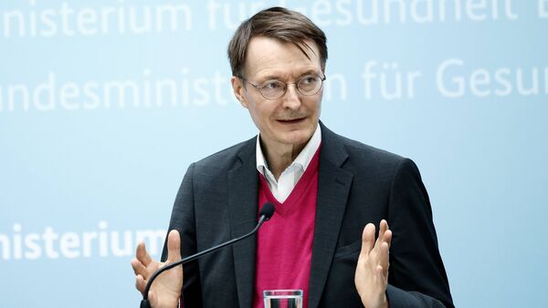 Gesundheitsminister Karl Lauterbach fordert eine beschleunigte Abkehr von fossilen Brennstoffen., © Carsten Koall/dpa