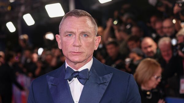 Daniel Craig kommt zur Premiere des Films «Glass Onion: A Knives Out Mystery» in London., © Vianney Le Caer/Invision via AP/dpa